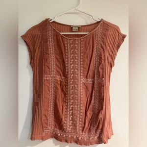 Luckybrand tanktop with embroidered flowers in the front.